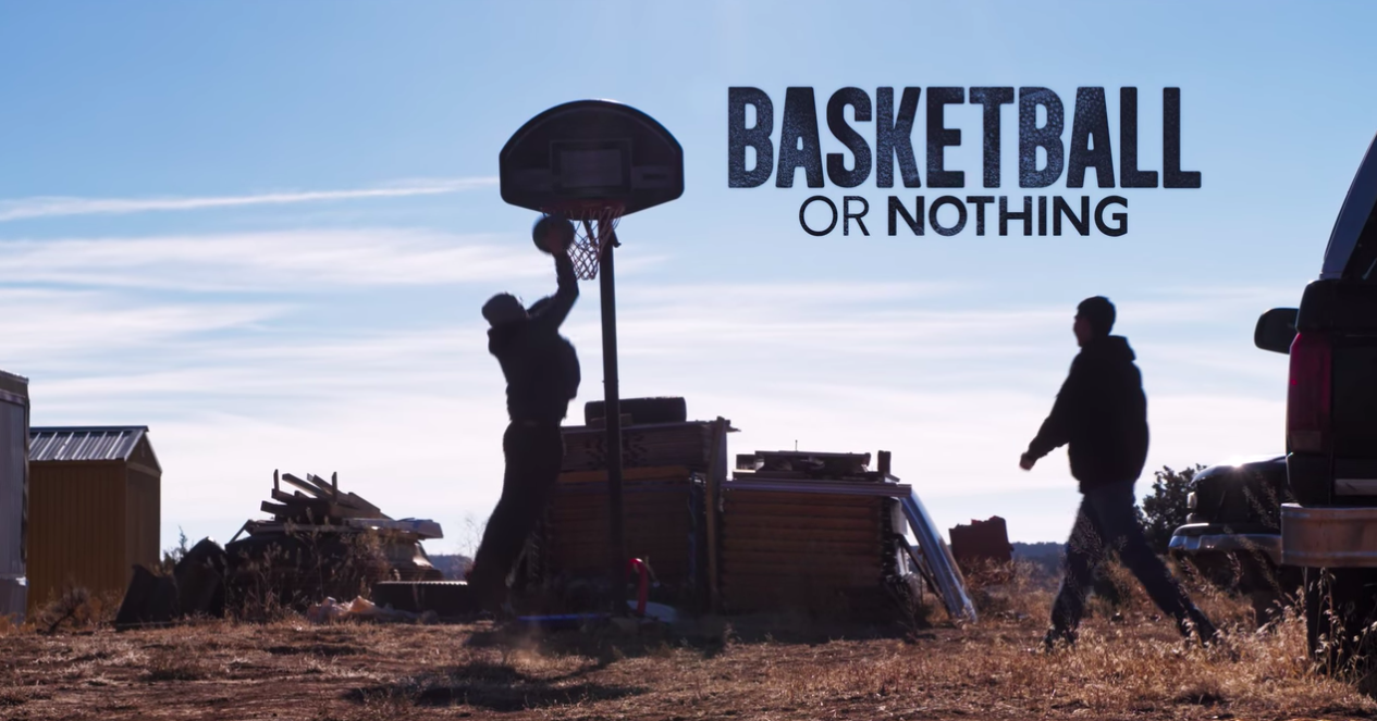 two people playing basketball on Navajo Nation