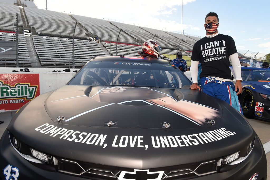 Bubba Wallace, driver of the #43 Richard Petty Motorsports Chevrolet, wears a 