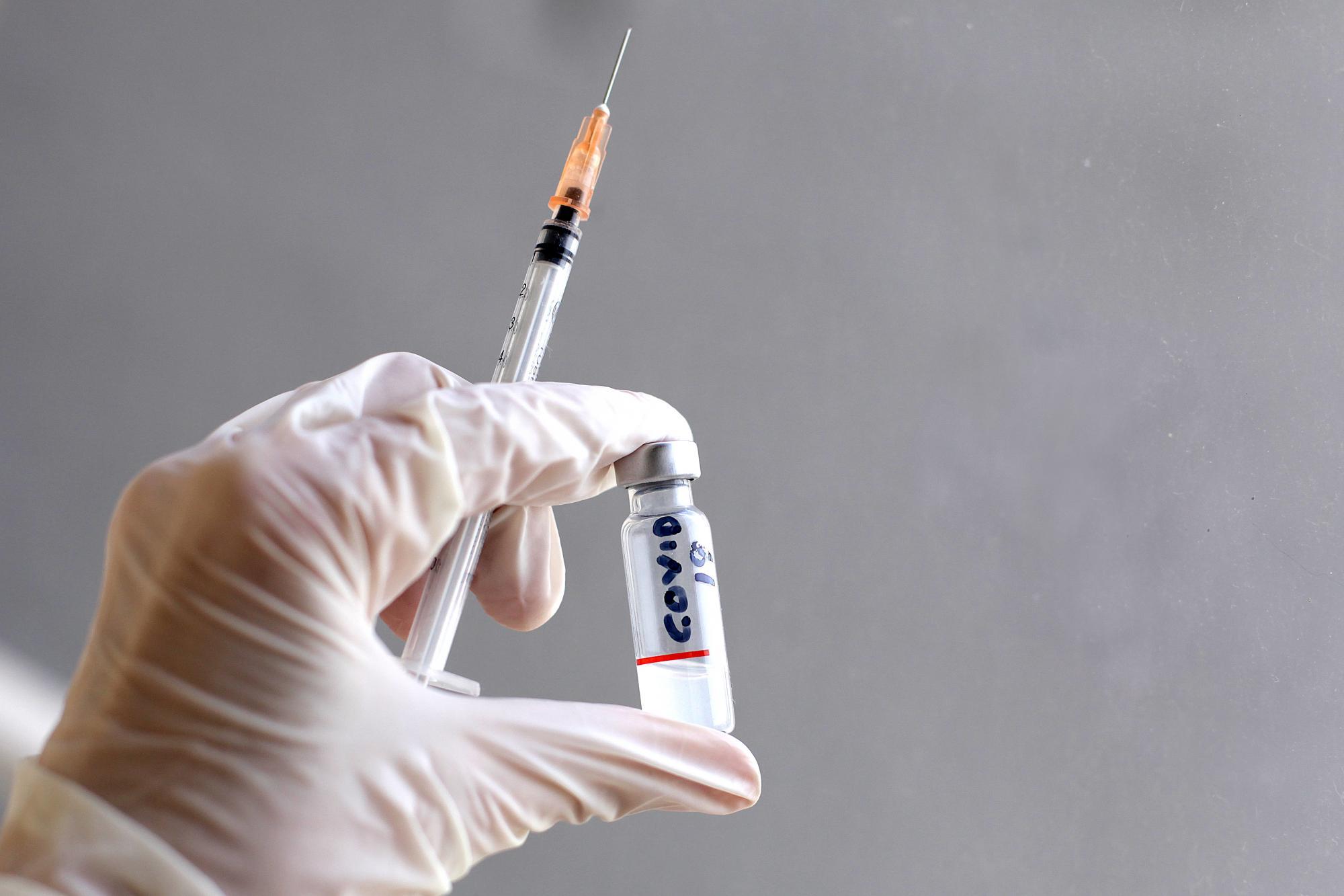 A photo illustration show a syringe. Argentina was selected to test a vaccine against COVID-19, it is estimated that the clinical phases will begin in August. 