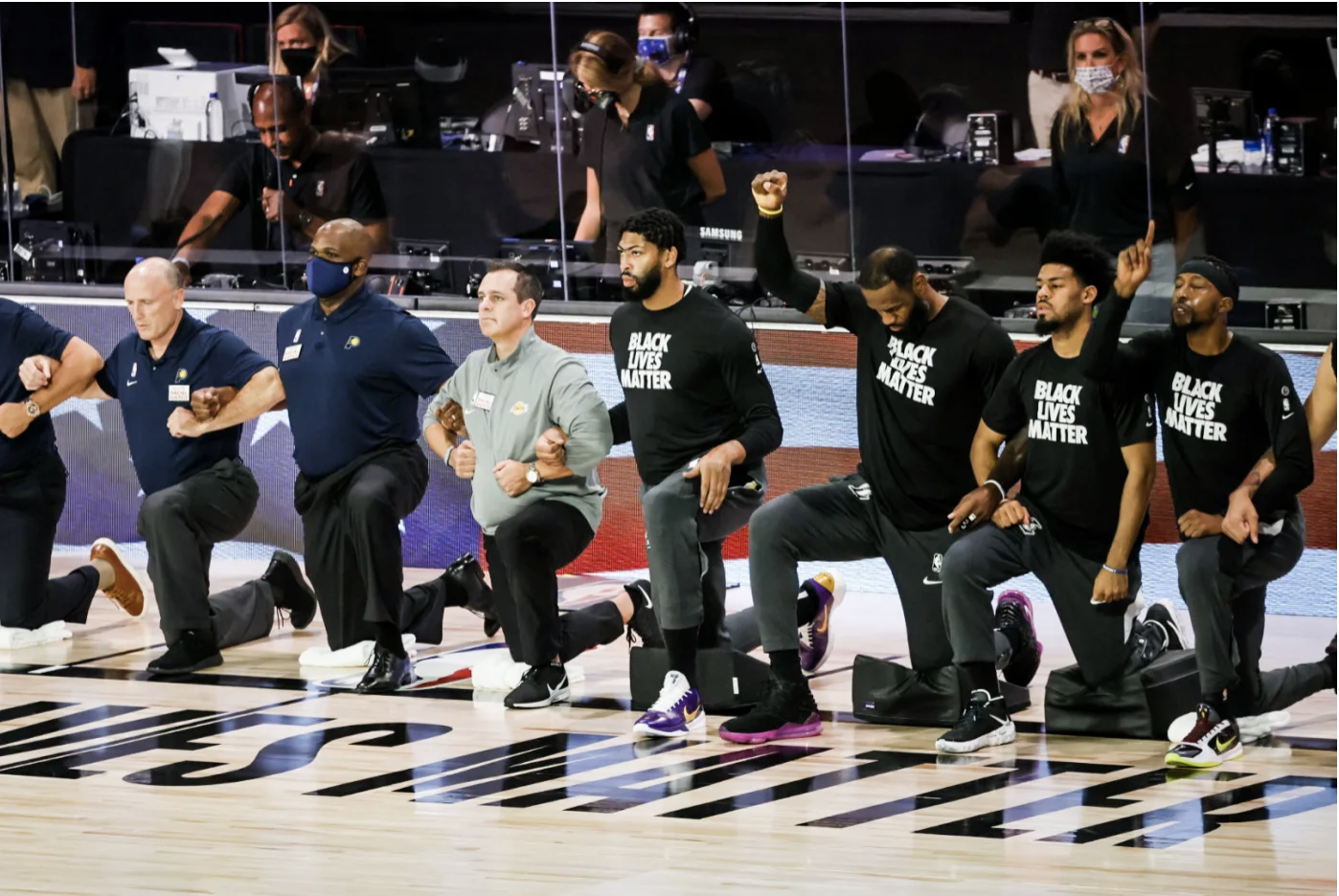 The NBA has largely supported its players' protests, including kneeling during the anthem.  David E. Klutho/Sports Illustrated