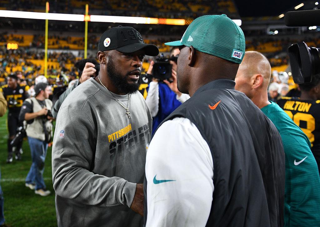 Mike Tomlin and Brian Flores