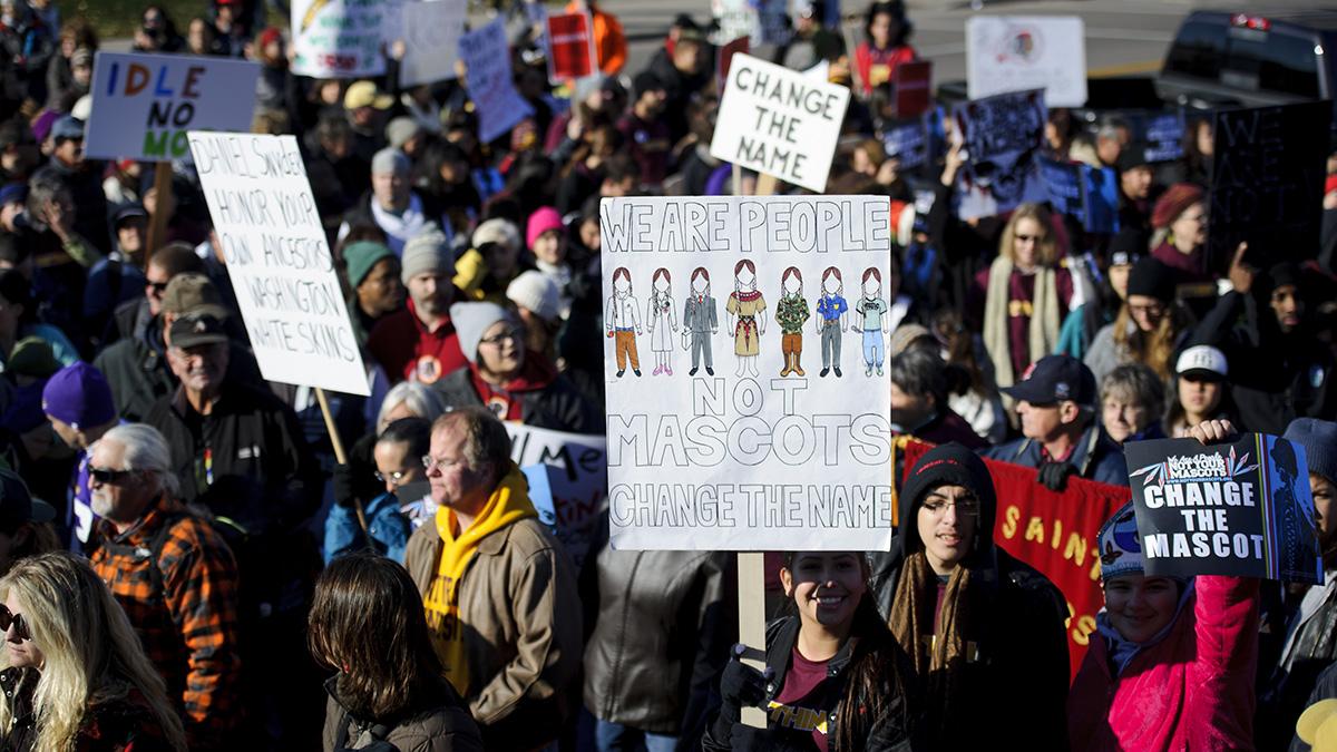 People march to TCF Bank Stadium to protest against the mascot for the Washington Redskins before the game against the Minnesota Vikings on November 2, 2014 at TCF Bank Stadium in Minneapolis, Minnesota. Opponents of the Redskins name believe it's a slur 